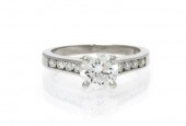 A Platinum and Diamond Ring Je