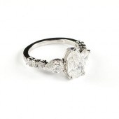 A PLATINUM AND PEAR CUT DIAMON