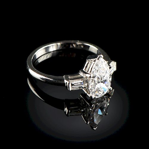 A PLATINUM AND PEAR-SHAPED