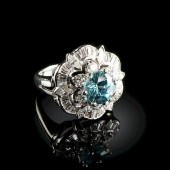 A PLATINUM, BLUE ZIRCON, AND D