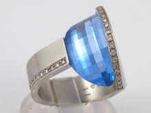 A platinum diamond and blue topaz