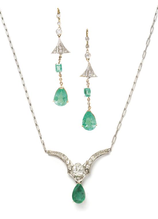 A Platinum Gold Emerald and Diamond