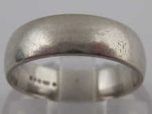 A platinum wedding band weighing