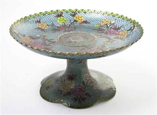 A Plique a Jour Tazza having a