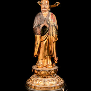 A Polychrome and Gilt Painted