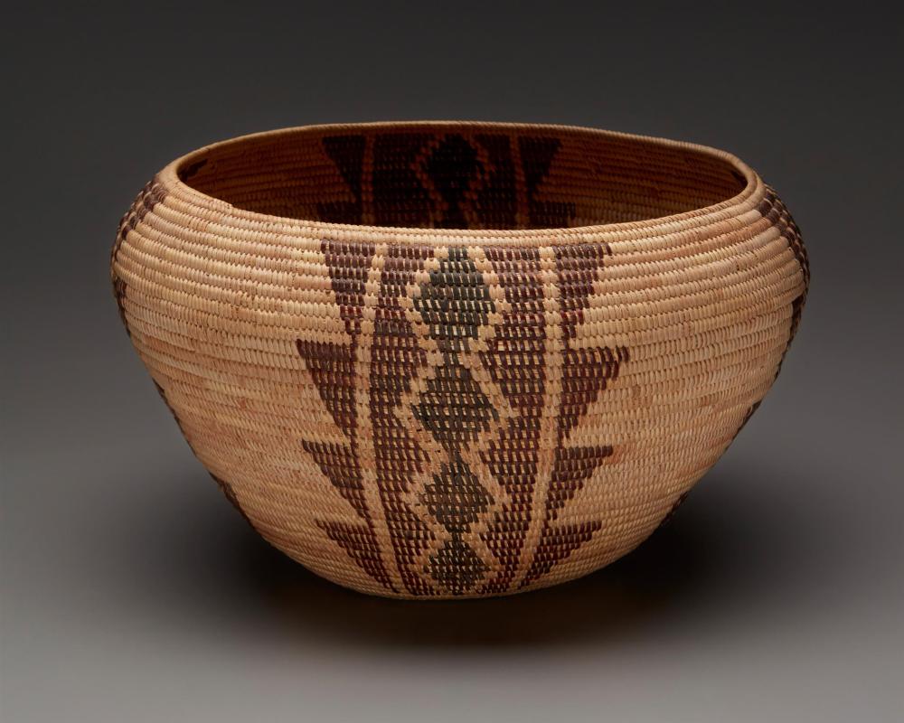A POLYCHROME MONO BASKET, WOVEN