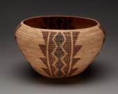 A POLYCHROME MONO BASKET, WOVE