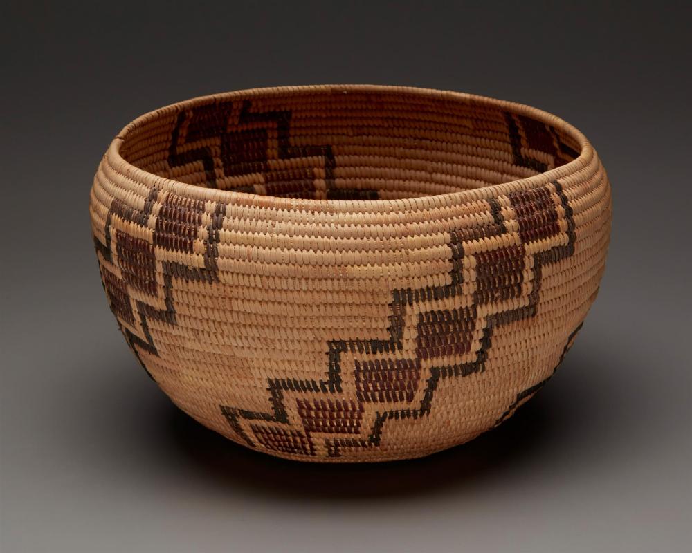 A POLYCHROME MONO BASKET, WOVEN
