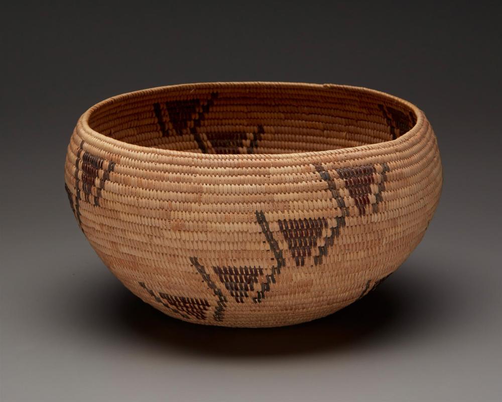 A POLYCHROME MONO BASKET, WOVEN
