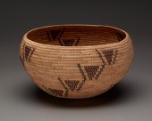 A POLYCHROME MONO BASKET, WOVE
