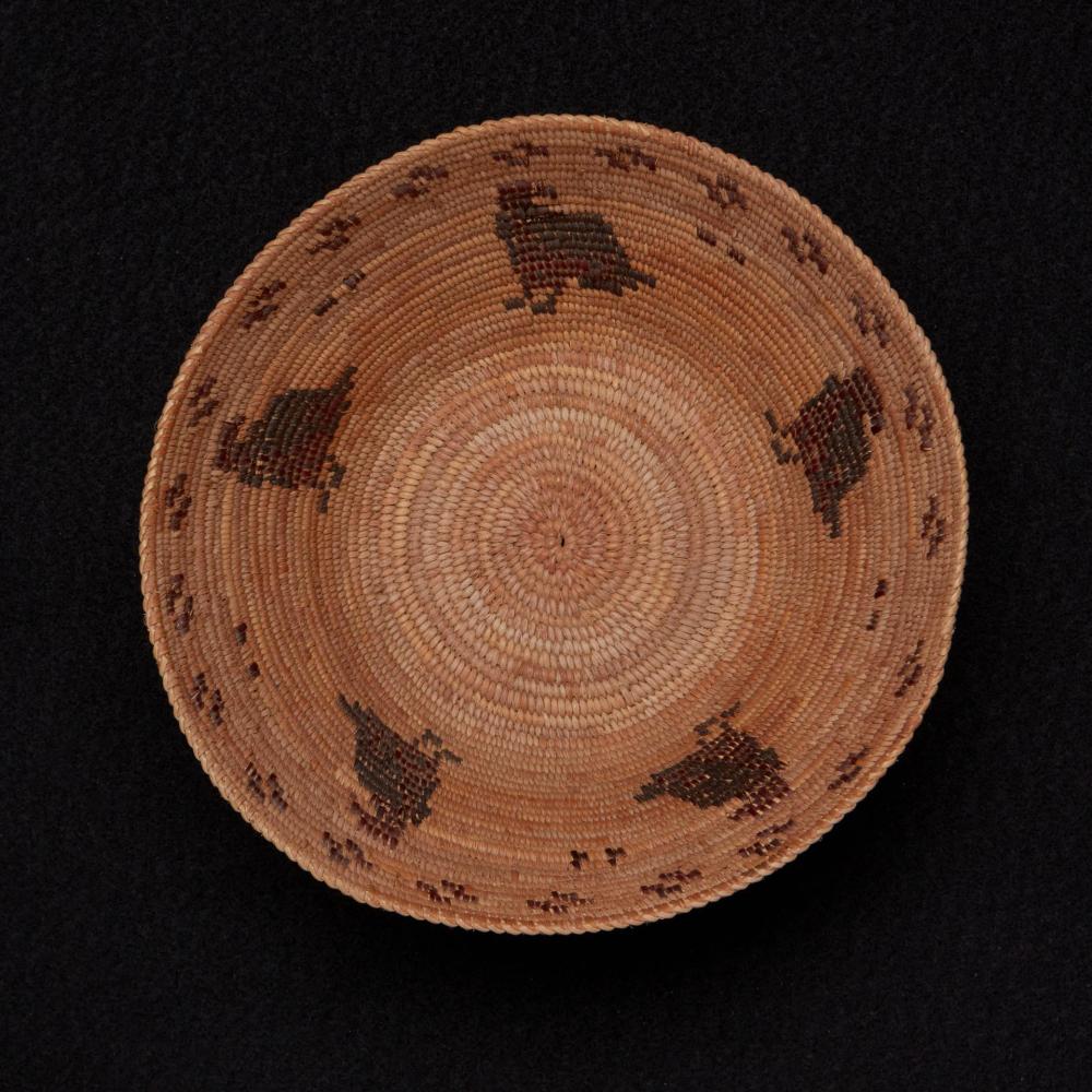 A POLYCHROME MONO PICTORIAL BASKET,