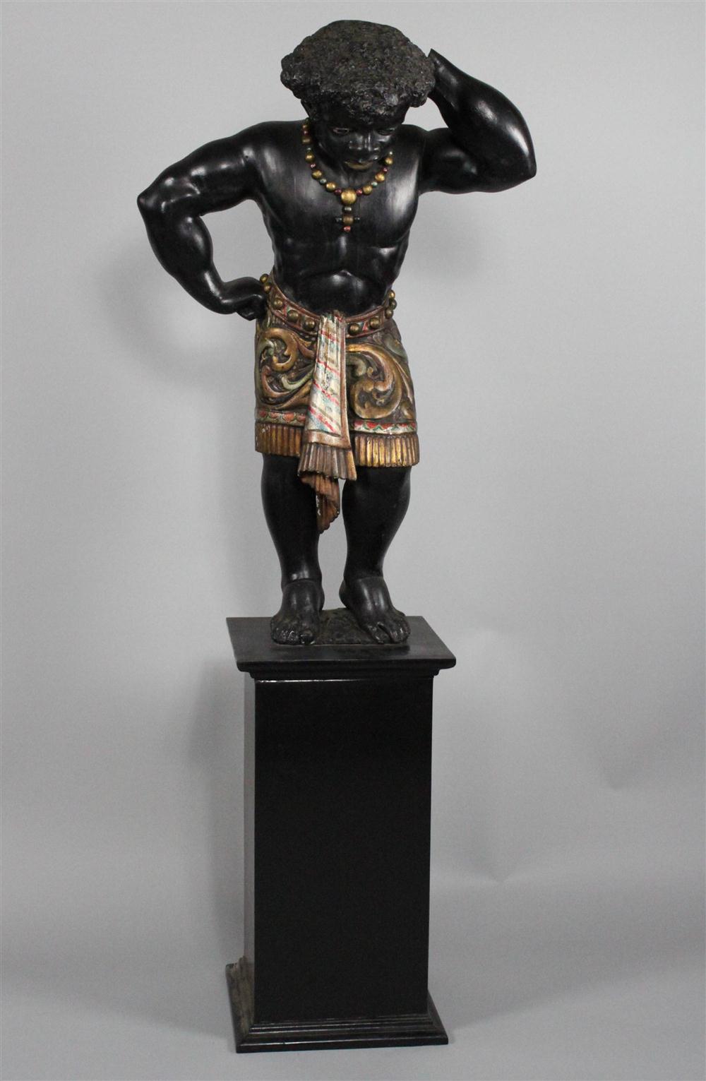 A POLYCHROME PAINTED BLACKAMOOR the