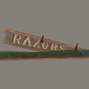 A Polychrome Painted Pine Razor