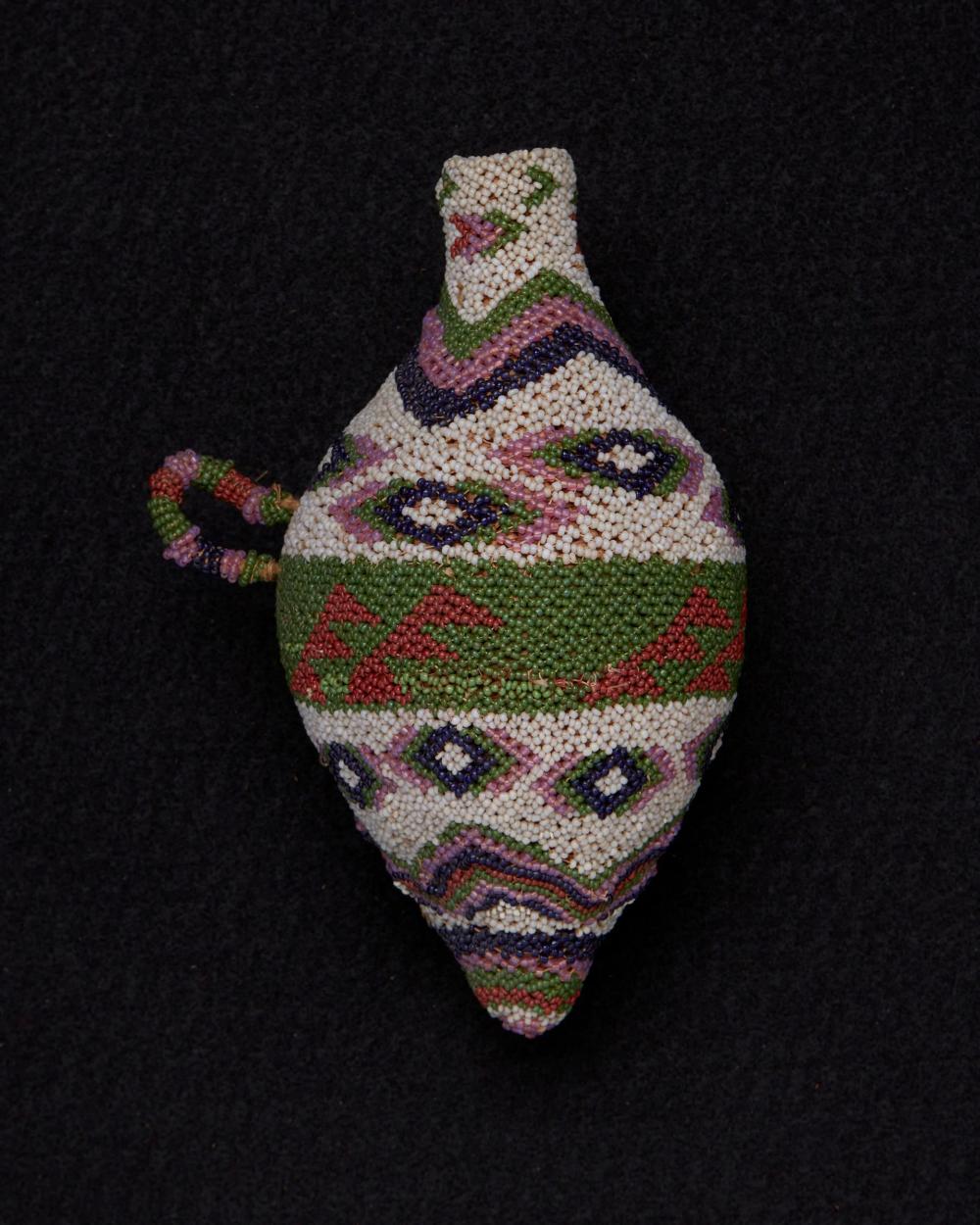 A POLYCHROME PAIUTE BEADED SEED JAR