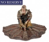A POLYCHROME WOOD AND CLOTH FI