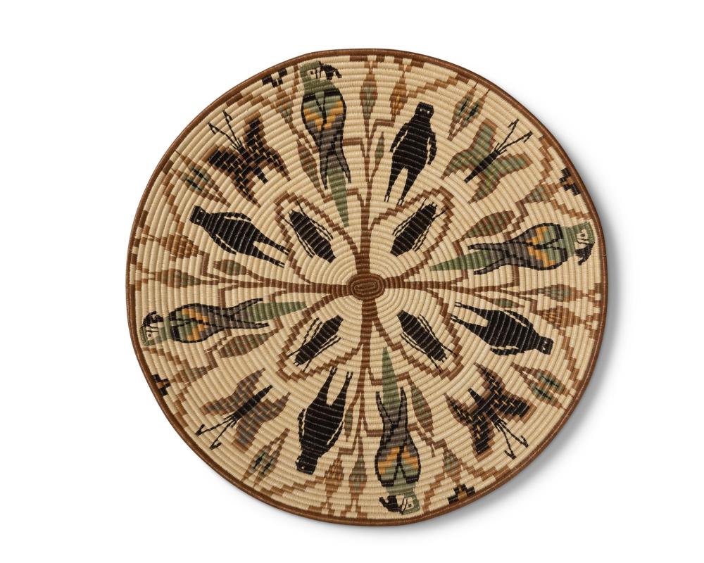 A POLYCHROME WOUNAAN BASKETRY TRAYA