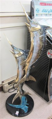 A POLYCHROMED BRONZE MARINE WI