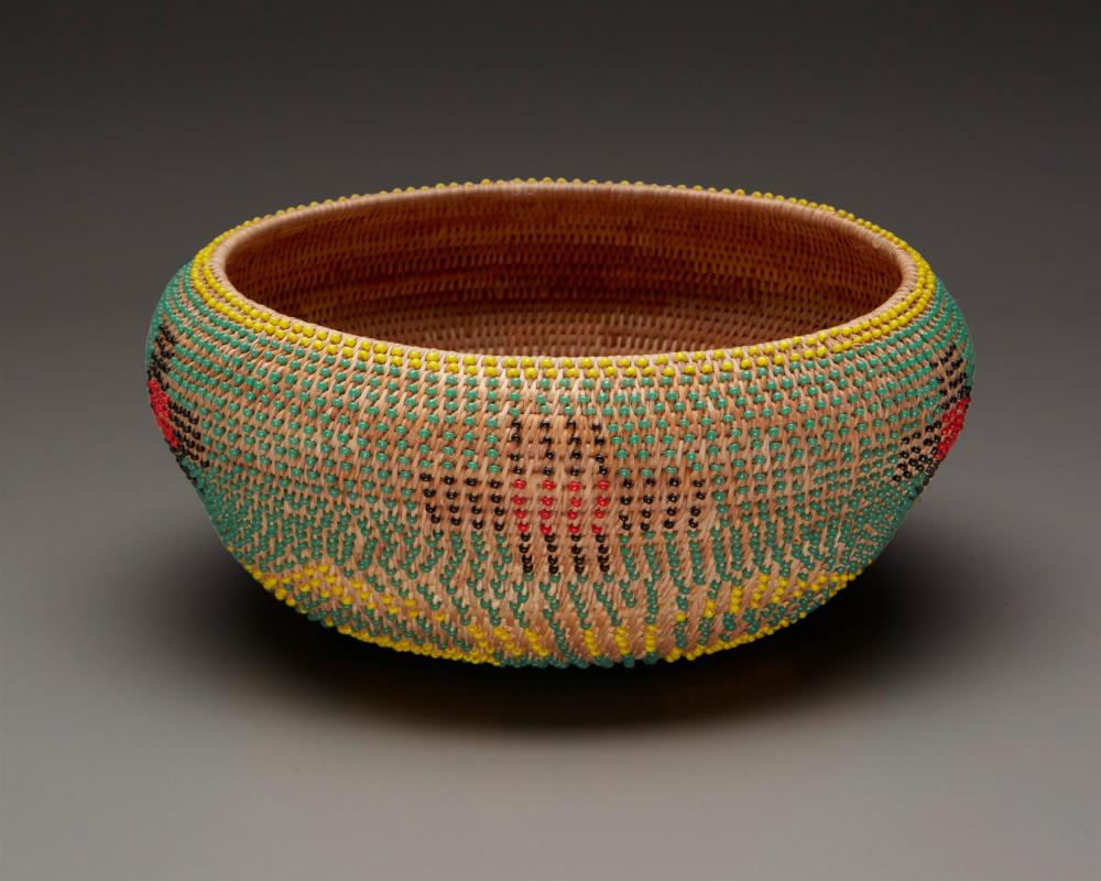 A POMO BEADED BASKETA Pomo beaded