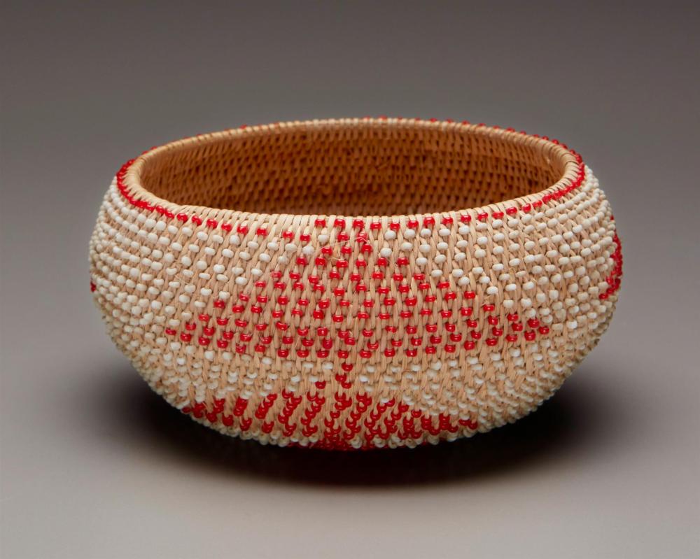 A POMO BEADED BASKETA Pomo beaded