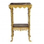 A POMPEIIAN STYLE GILT BRONZE