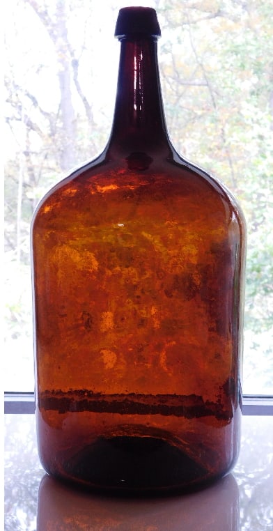 A PONTILED "OLD AMBER" 19TH C.