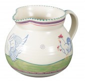 A POOLE POTTERY JUG PAINTED BY