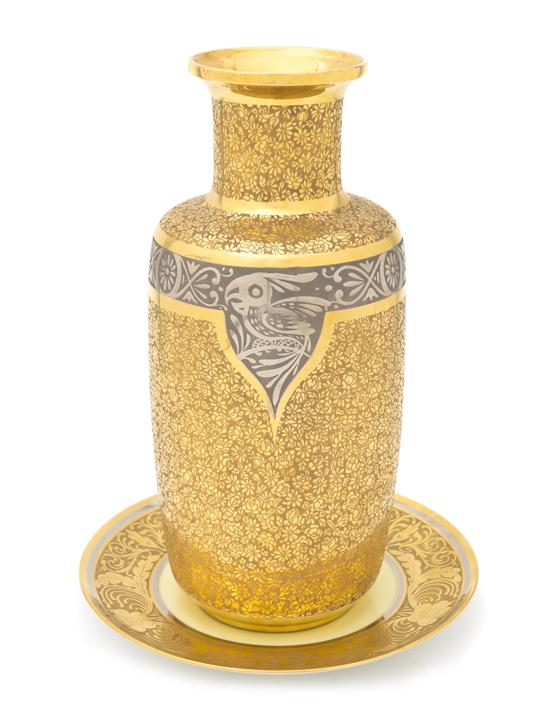 A Porcelain and Metal Inset Vase of