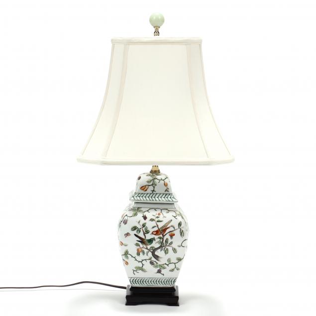 A PORCELAIN BIRD AND FLOWER COVERED