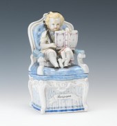 A Porcelain Figural Tobacco Co