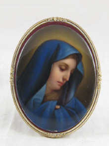 A porcelain hand painted plaque