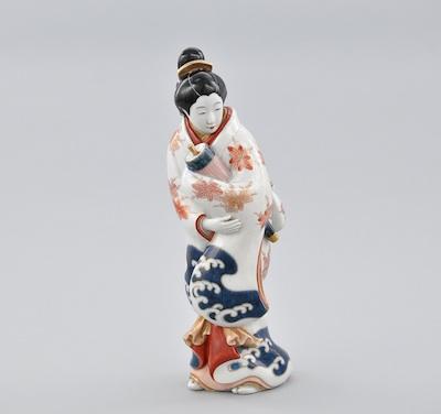 A Porcelain Kakiemon Bijin The