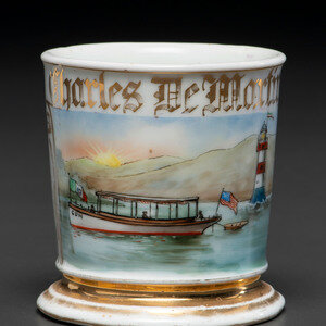 A Porcelain Shaving Mug Depicting a