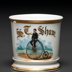 A Porcelain Shaving Mug Depicting a