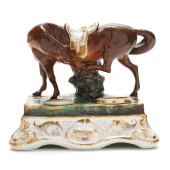 A PORCELAIN STANDISH WITH HORS