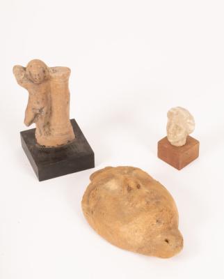 A pottery figure of Eros,