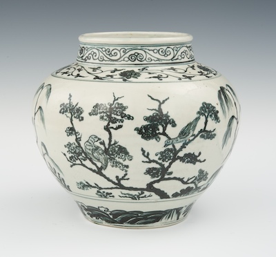 A Pottery Vase With Dark Teal