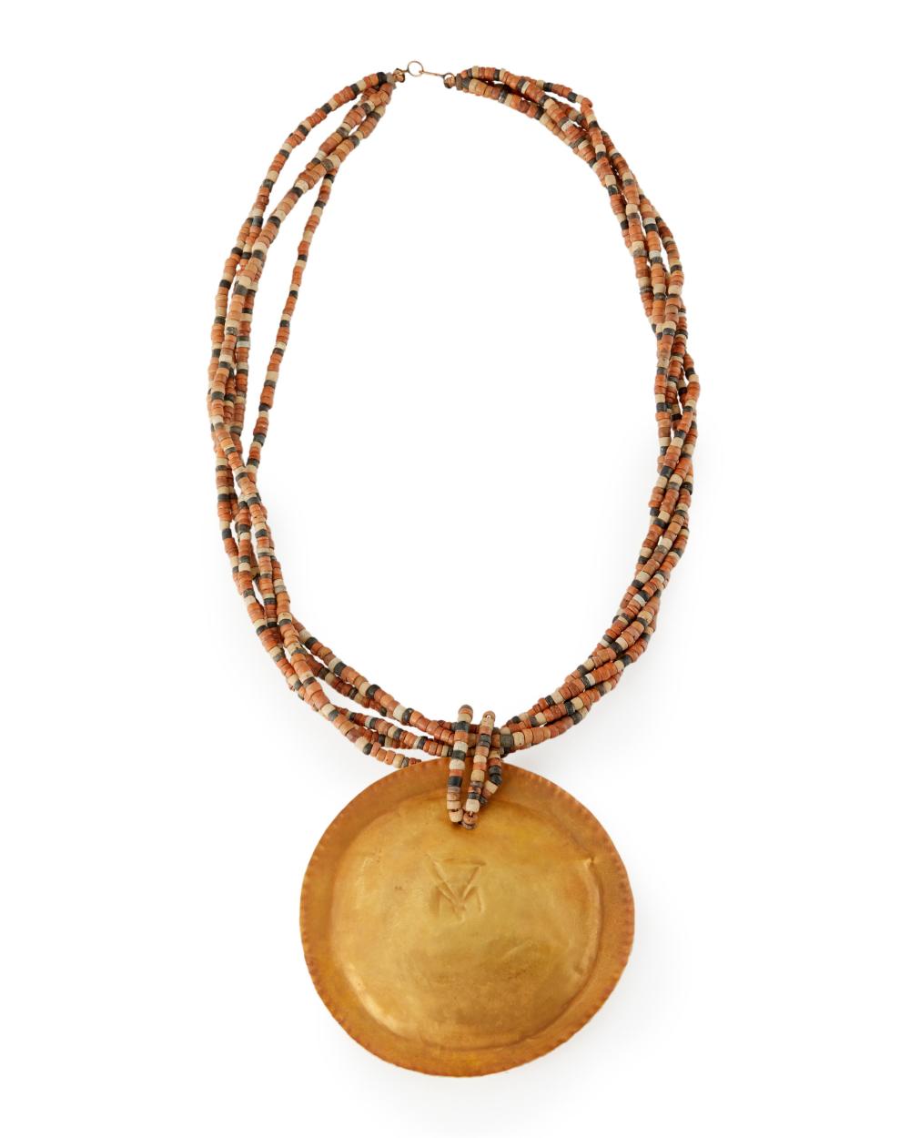A PRE-COLUMBIAN TUMBAGA AND BEAD