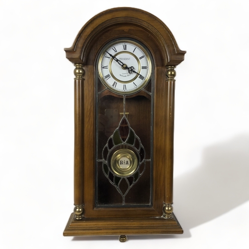 A PRESIDENT QUARTZ WALL CLOCK. WITH