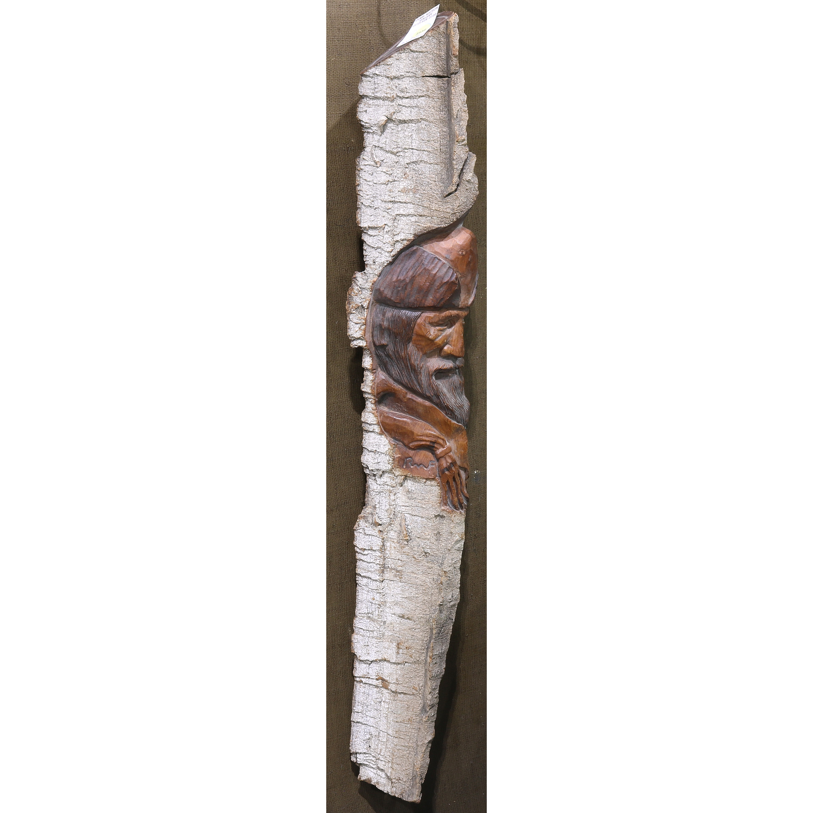 A PRIMITIVE DRIFTWOOD CARVING