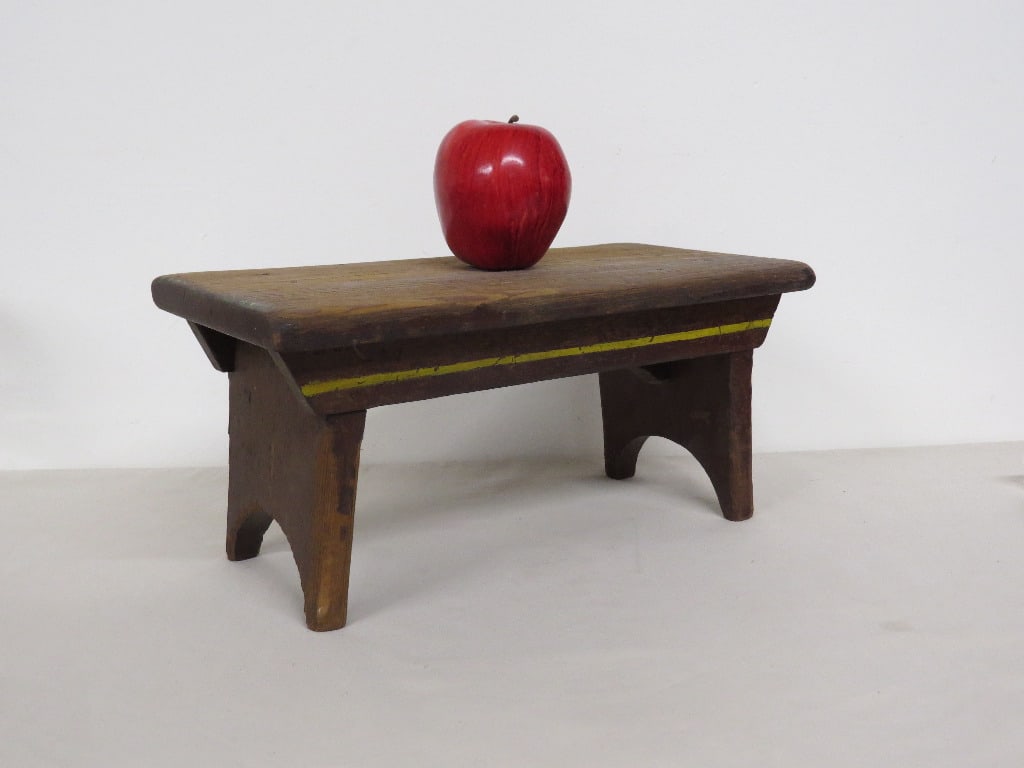 A PRIMITIVE JACKBOOT STOOL W/YELLOW