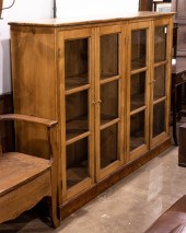 A PRIMITIVE PINE CASE BISECTIO