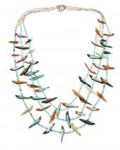 A PUEBLO TURQUOISE CARVED STON