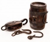 A pulley hoist with wrought ir