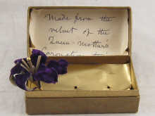 A purple velvet flower made from