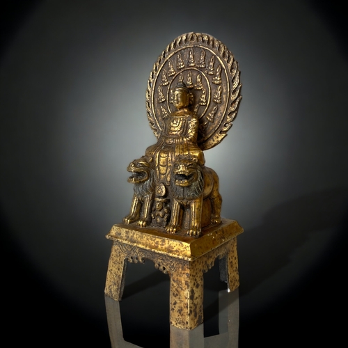 A QING DYNASTY TIBETAN GILT