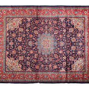 A Qom Wool Rug 20th Century 13 feet