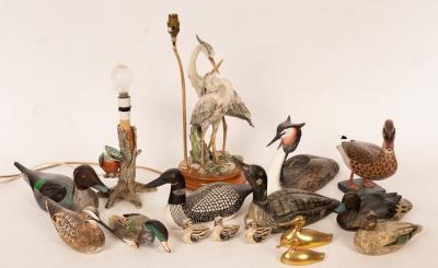 A quantity of carved and painted