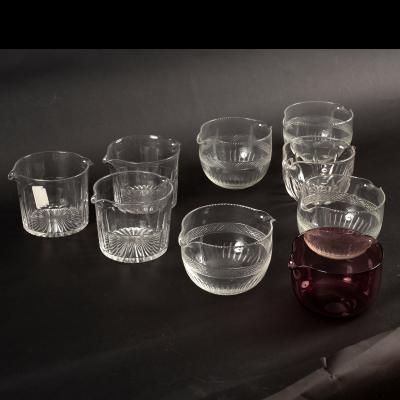 A quantity of glass finger bowls