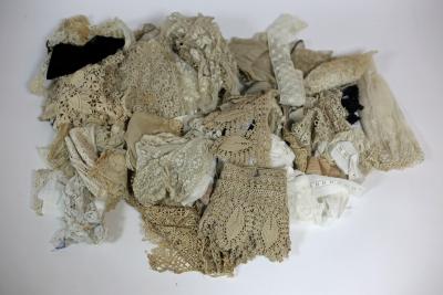 A quantity of lace, crochet and