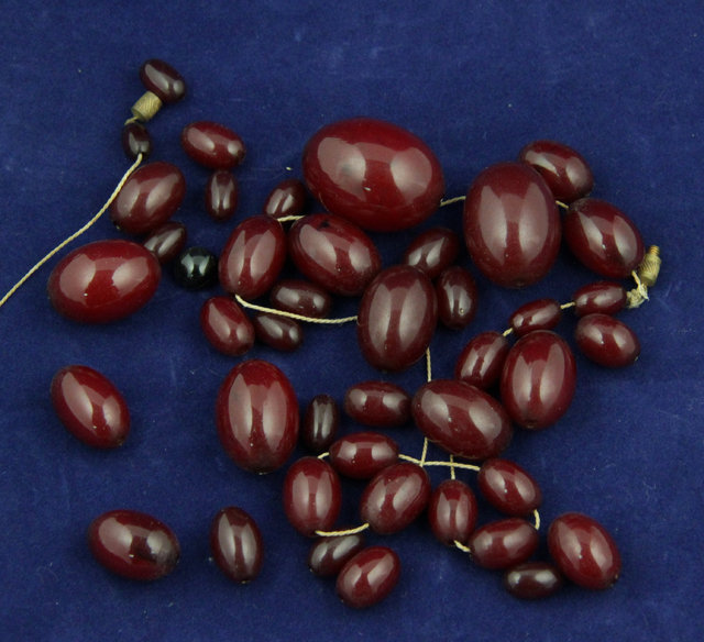 A quantity of oval amber beads